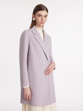 a lady in wool violet  notched lapel coat